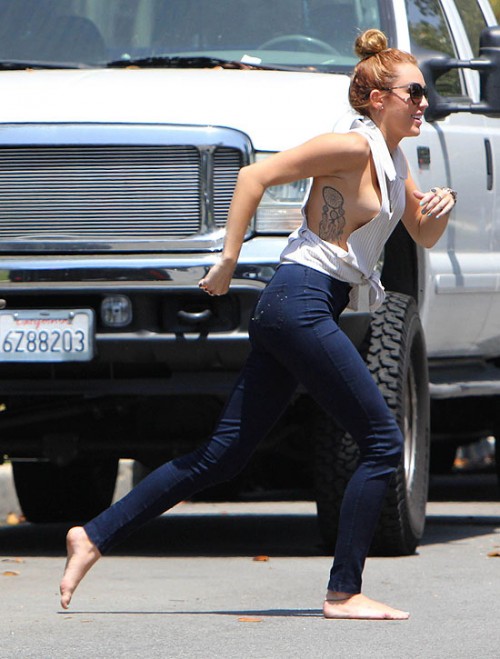 Miley Takes Her Side Boob Out For A Nice Jog